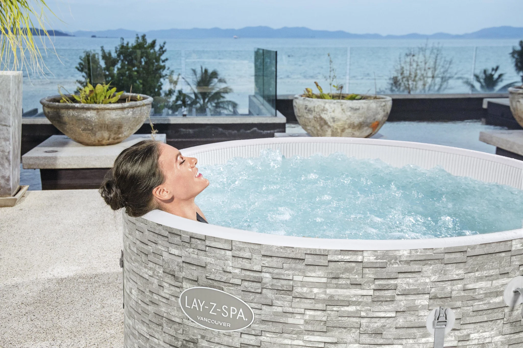 Luxury heated jacuzzi spa experience with ocean view in Kuta villa - premium wellness retreat with professional massage Kuta service and traditional Balinese healing atmosphere